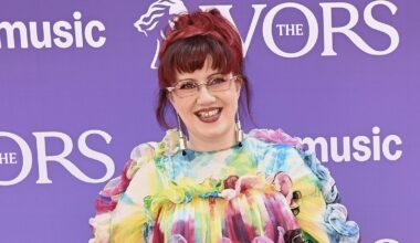 CMAT stuns in patterned gown and platforms at Ivor Novello Awards