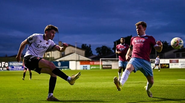 Eoin Kenny of Dundalk in action against Conor Kane of Drogheda United during the SSE Airtricity Men's Premier Division match between Drogheda United and Dundalk at Sullivan & Lambe Park in Drogheda, Louth.