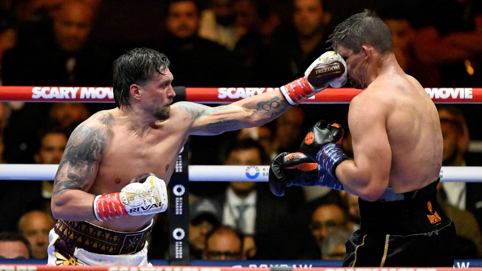 Usyk survives huge scare with 11th round stoppage