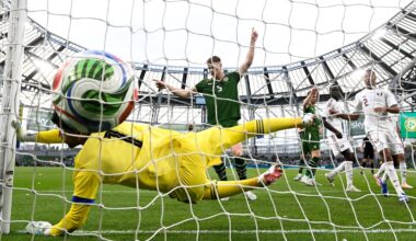 Ten-man Ireland edge Qatar amid tennis ball protests