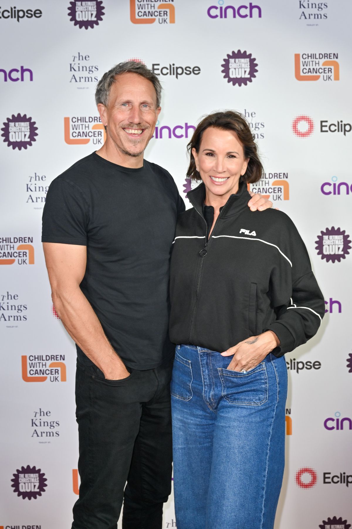 Nick Feeney and Andrea McLean attend the Children With Cancer Annual Christmas Quiz at The Kings Arms Pub on December 9, 2025 in London