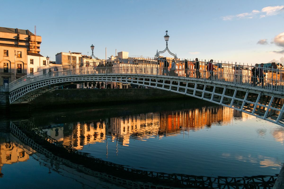 Ha'penny Bridge over the Liffey River in the centre of Dublin City, Ireland.