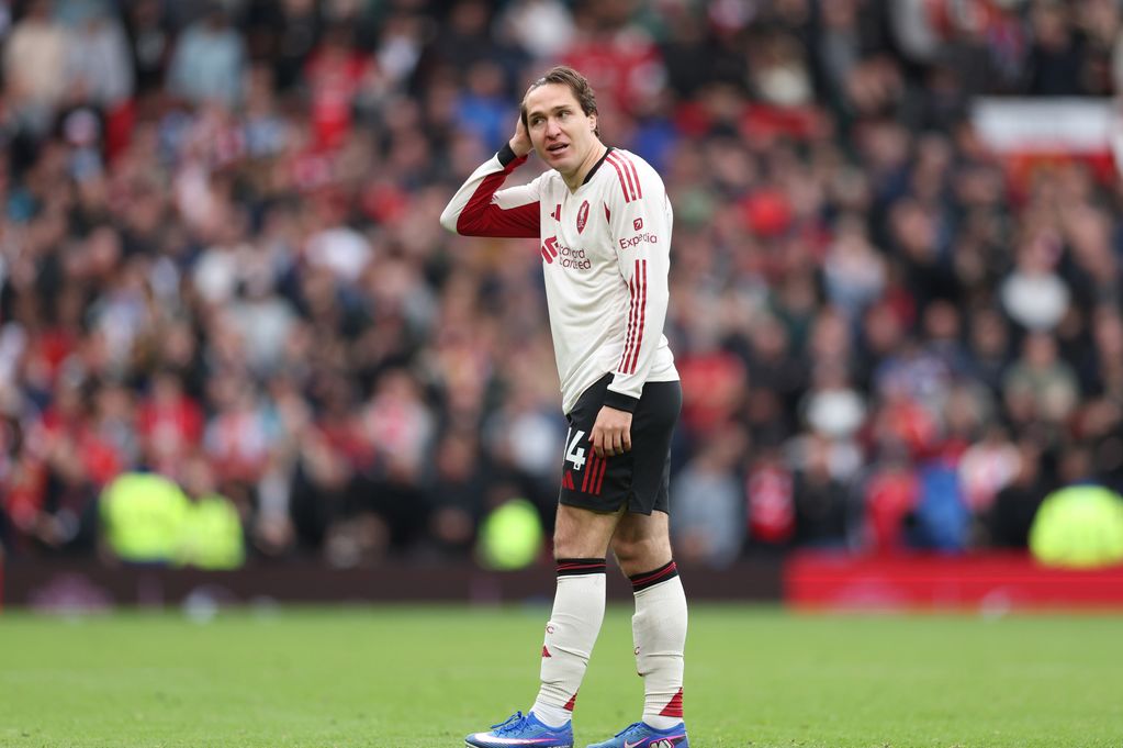 : Federico Chiesa of Liverpool looks dejected following the Premier League match between Manchester United and Liverpool