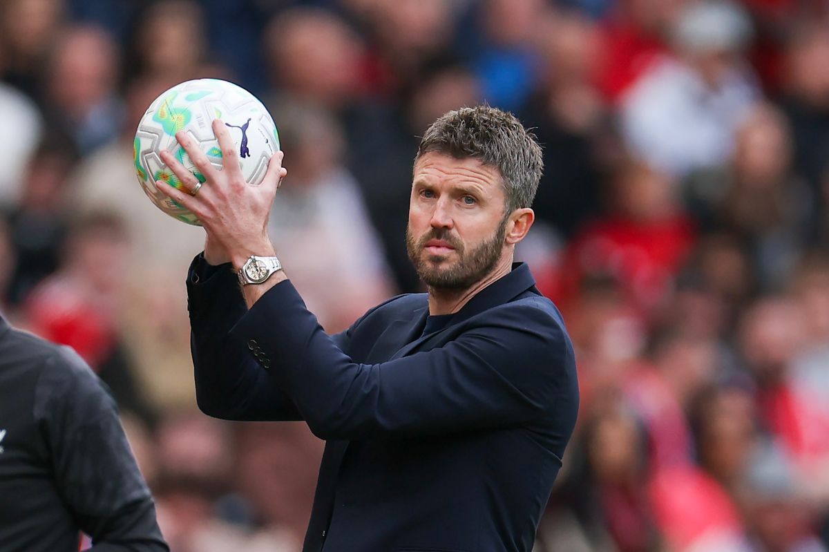 Manchester United manager Michael Carrick catches the ball during the Premier League match between Manchester United and Nottingham Forest at Old Trafford on May 17, 2026 in Manchester, United Kingdom.