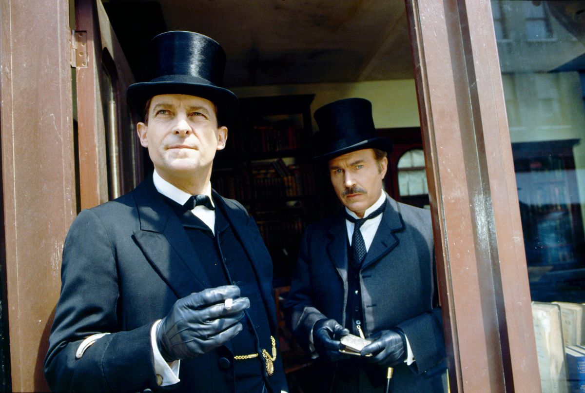 Jeremy Brett (left) and David Burke (right) in The Adventures of Sherlock Holmes