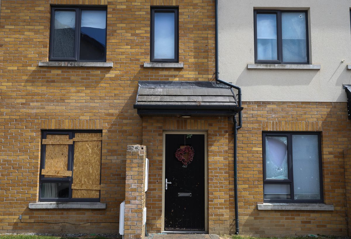 Damage to house after a grenade exploded outside a property in Ballymun