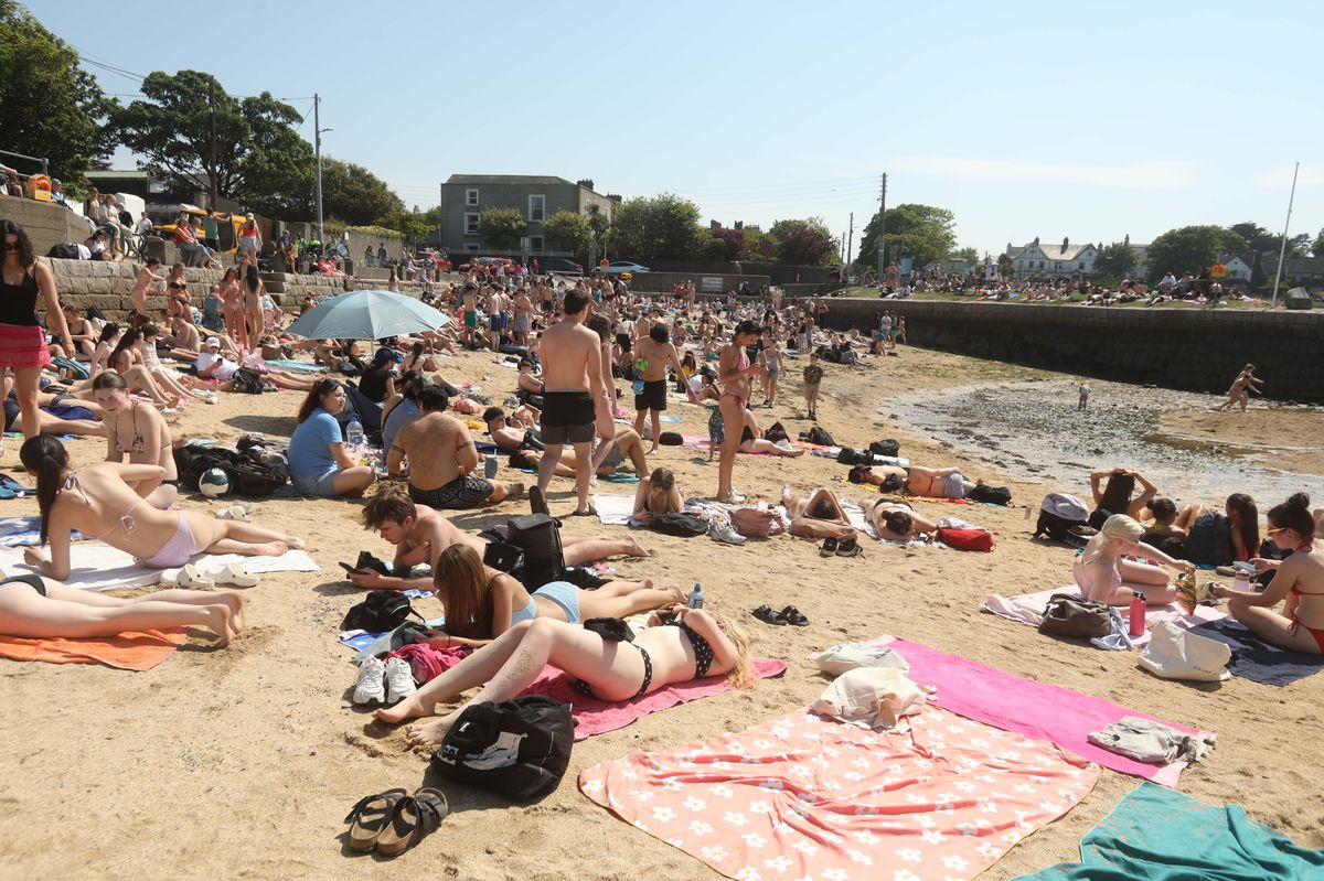 People enjoying the heatwave on Sandycove Beach in Dublin