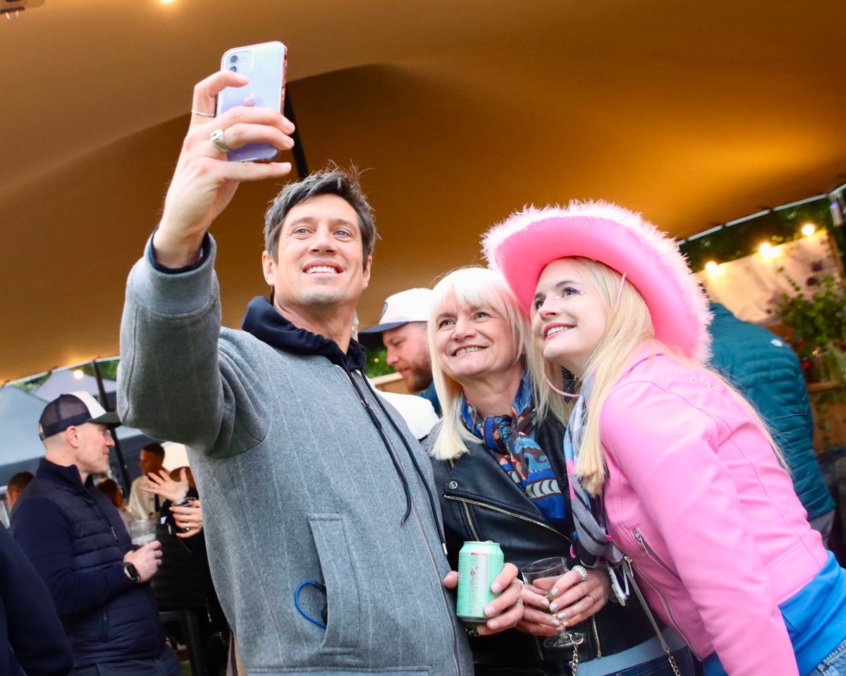 The pair made time for fans as they partied at the festival