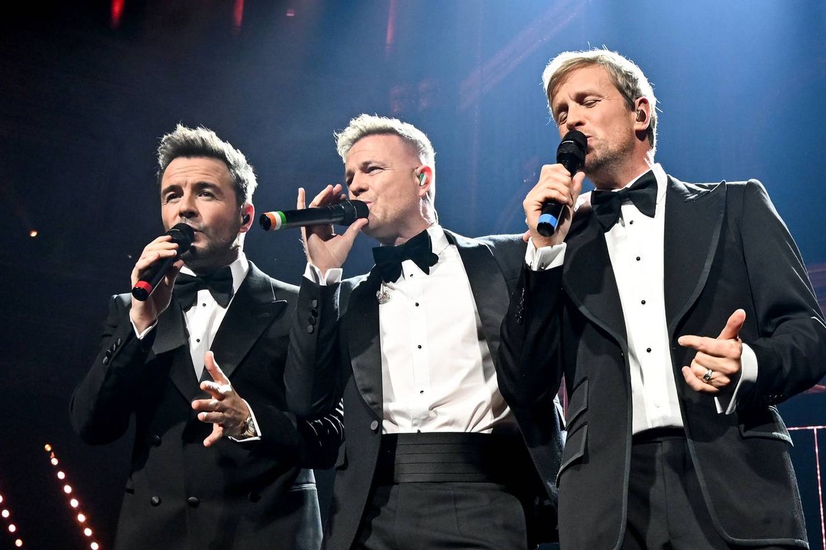 Shane Filan, Nicky Byrne and Kian Egan of Westlife