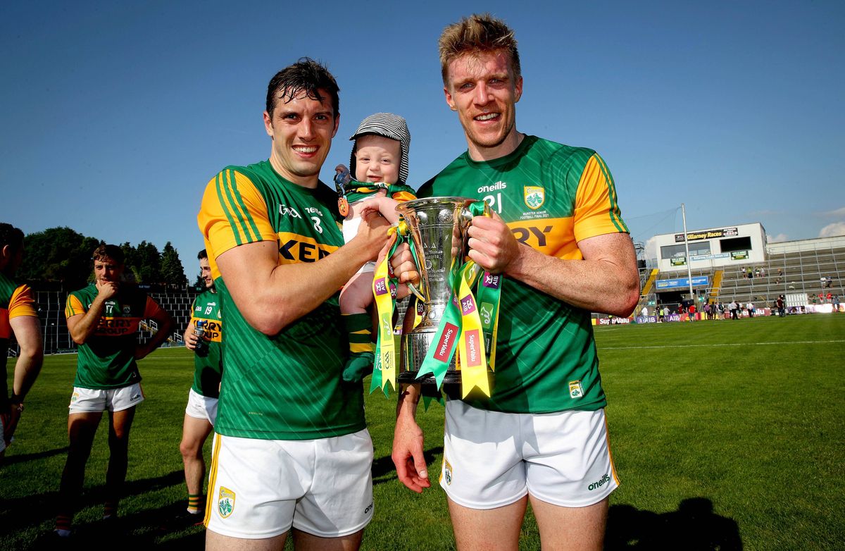 Kerry’s David Moran celebrates with son Eli and Tommy Walsh after winning the Munster title in 2021. Moran and Walsh went on AFL trials back in 2008 with Walsh signing a deal with St. Kilda.