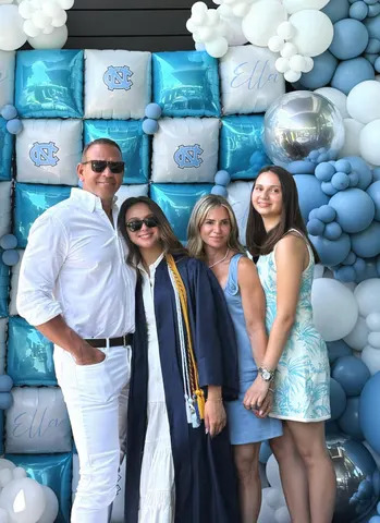 Alex Rodriguez and Cynthia Scurtis with their daughters Ella and Natasha.Credit: Alex Rodriguez/Instagram