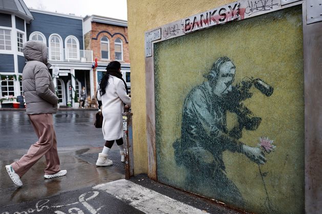 Libel case against guerilla artist Banksy ‘a ruse to expose his identity’, judge rules