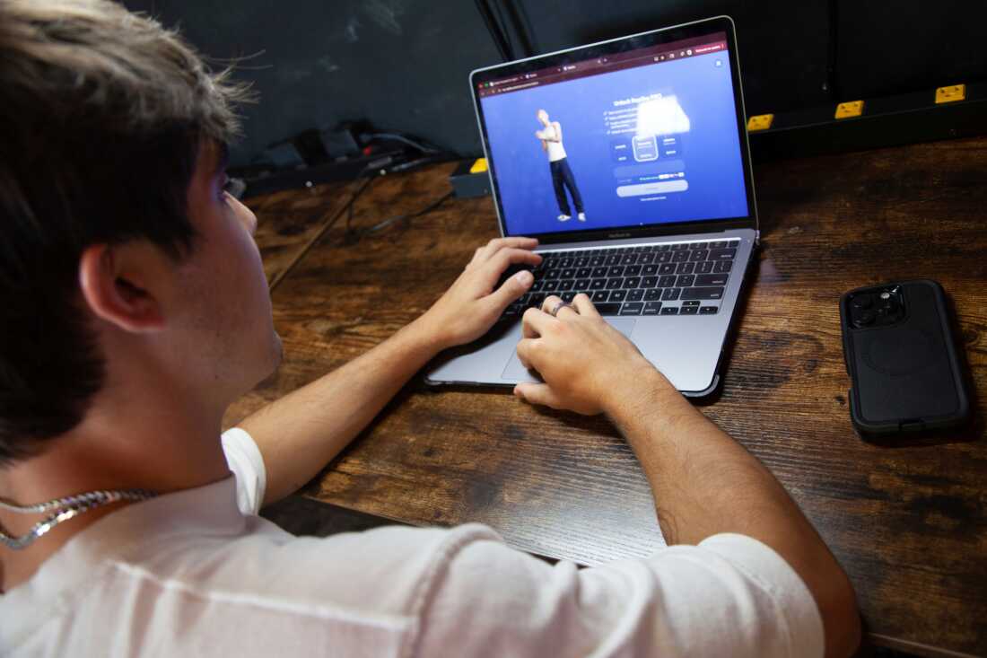 Bruce Perry, 17, demonstrates the possibilities of artificial intelligence by creating an AI companion on Character.AI,, July 15, 2025, in Russellville, Ark.