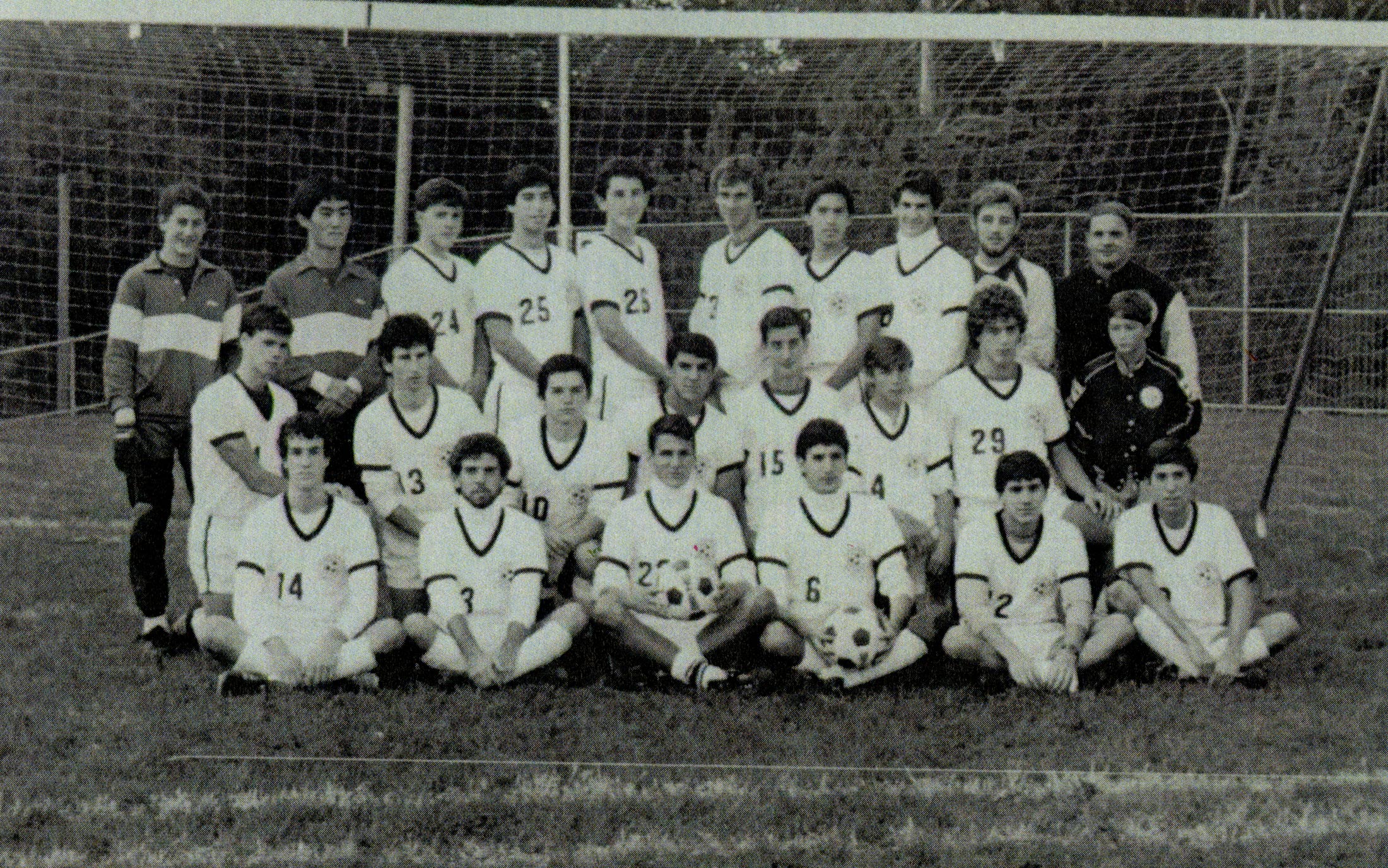 Jassy (No. 13) with his high school soccer team.