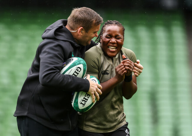 denis-fogarty-shares-a-joke-with-linda-djougang