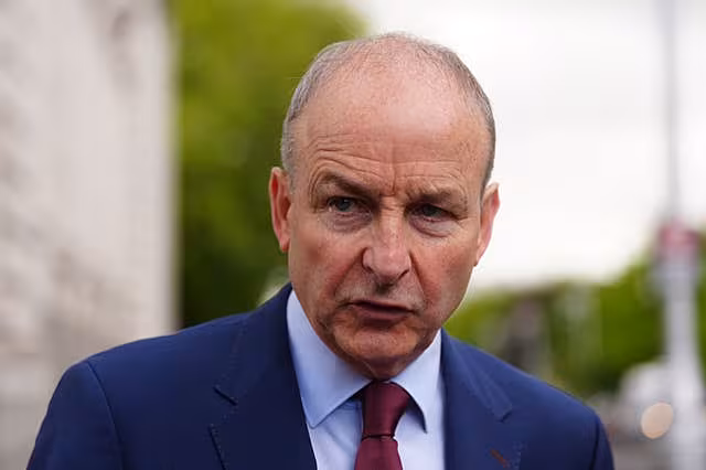 Taoiseach Micheal Martin speaks to journalists