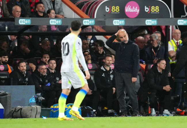manchester-city-manager-pep-guardiola-right-reacts-on-the-touchline-during-the-premier-league-match-at-the-vitality-stadium-bournemouth-picture-date-tuesday-may-19-2026