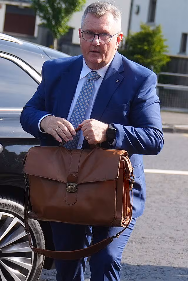 Jeffrey Donaldson outside Newry Crown Court holding a briefcase