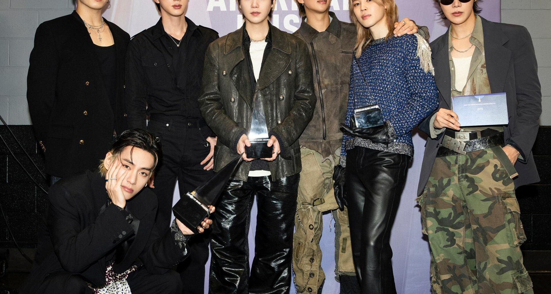 K-pop boy group BTS poses after winning Artist of the Year during the American Music Awards at the MGM Grand Garden Arena in Las Vegas, Tuesday (local time). Courtesy of BigHit Music
