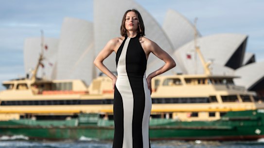 A model in Carla Zampatti before the opening show of Australian Fashion Week 2025 outside the Museum of Contemporary Art.