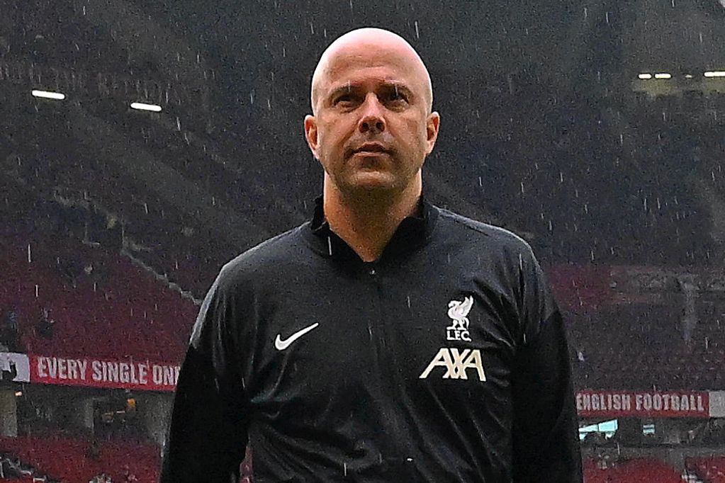 Arne Slot Head Coach of Liverpool on the pitch before the Premier League match between Manchester United FC and Liverpool FC at Old Trafford on September 01, 2024 in Manchester, England.