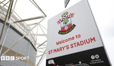 A general view of a sign showing Southampton's badge outside St Mary's Stadium