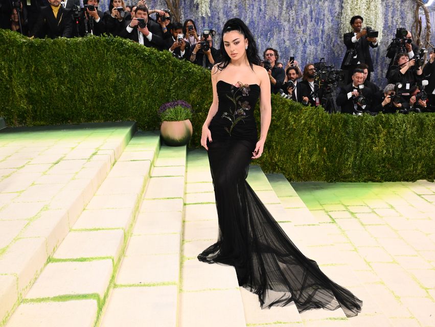 Charli XCX wore a Yves Saint Laurent gown to the Met Gala (Matt Crossick/PA)