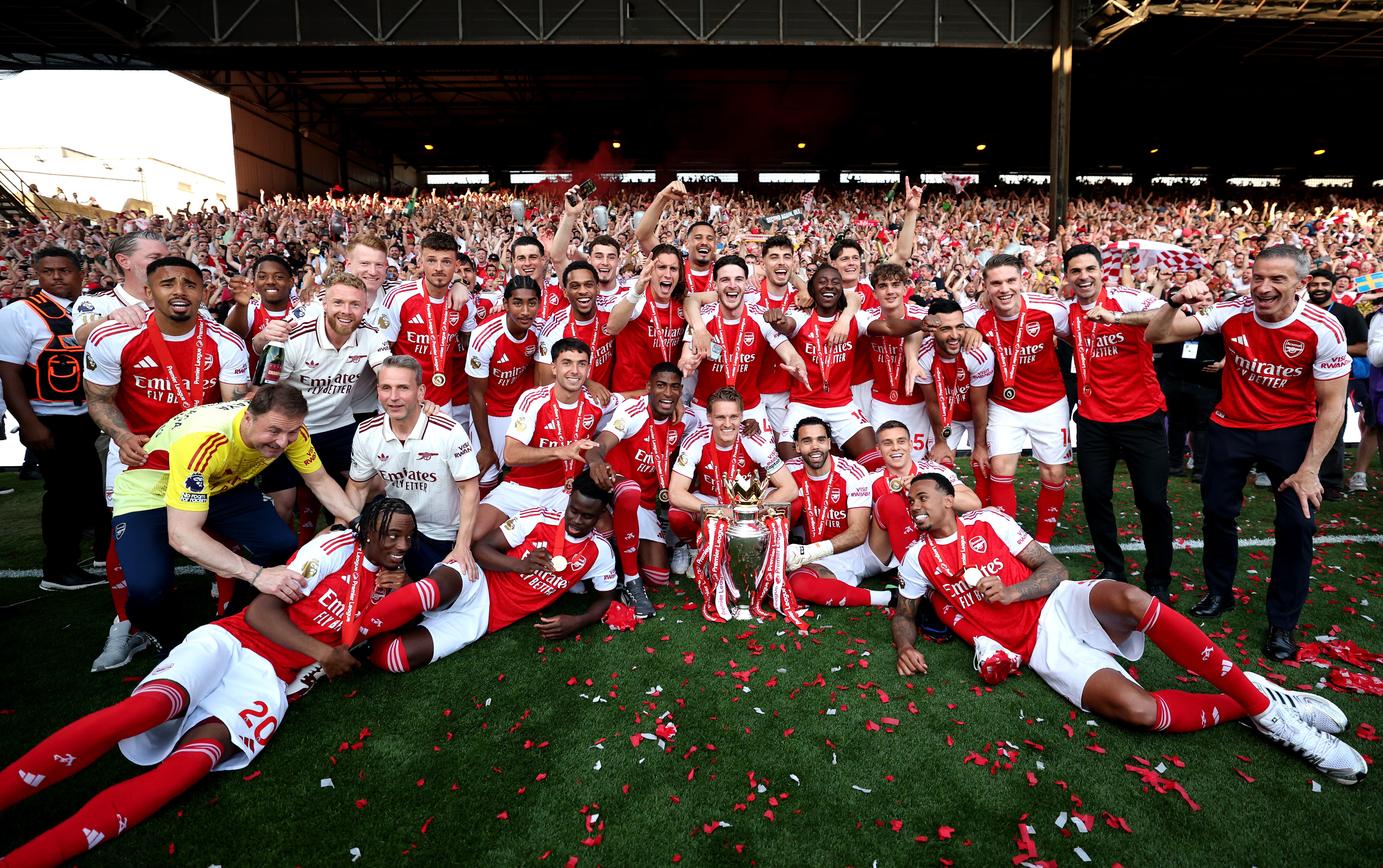 Arsenal’s players celebrate their Premier League title triumph at Selhurst Park on Sunday, the club’s first for 22 years
