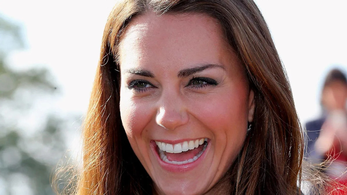 Kate Middleton is a heatwave bombshell in plunging halterneck sundress and 'unroyal' hair