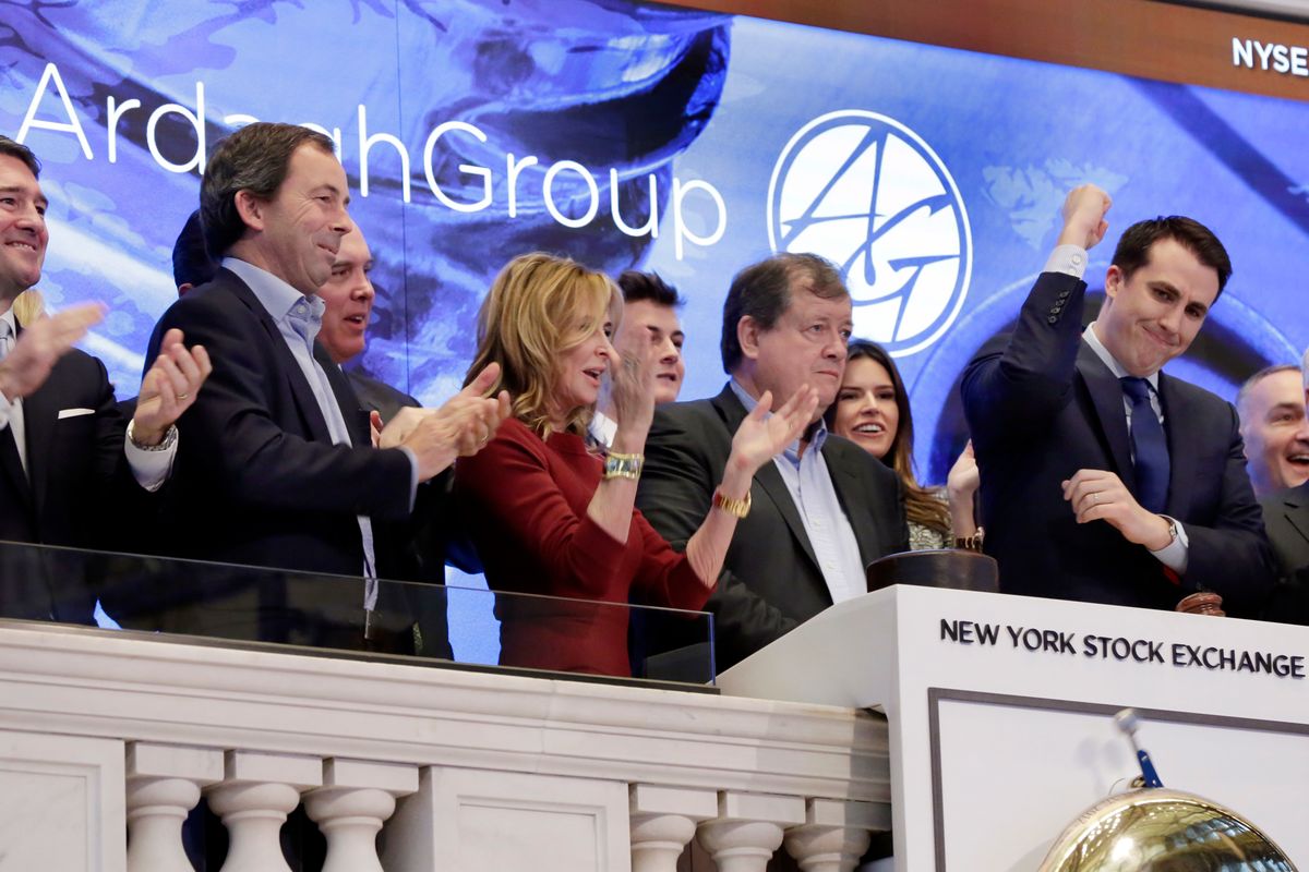 Ardagh Group Chairman Paul Coulson, second from right, is applauded as he rings the New York Stock Exchange opening bell to celebrate his company's IPO, Wednesday, March 15, 2017.