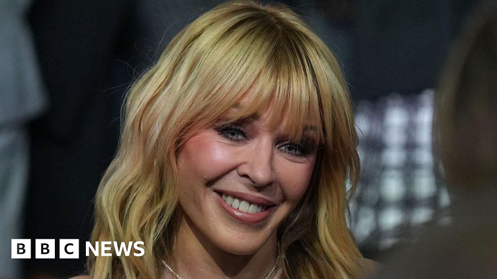 Kylie Minogue says cancer experience 'still with me' - BBC