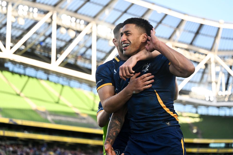 Rieko Ioane of Leinster celebrates with teammate Max Deegan after scoring their side's seventh try against Edinburgh. Photo: Brendan Moran/Sportsfile