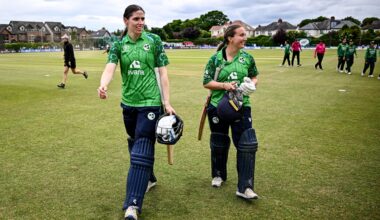 Rebecca Stokell and Leah Paul walk off the field after win