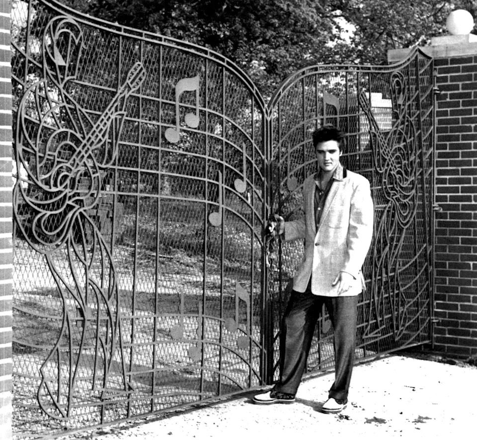 Elvis in wrought iron, and in the flesh, at the gates to Graceland