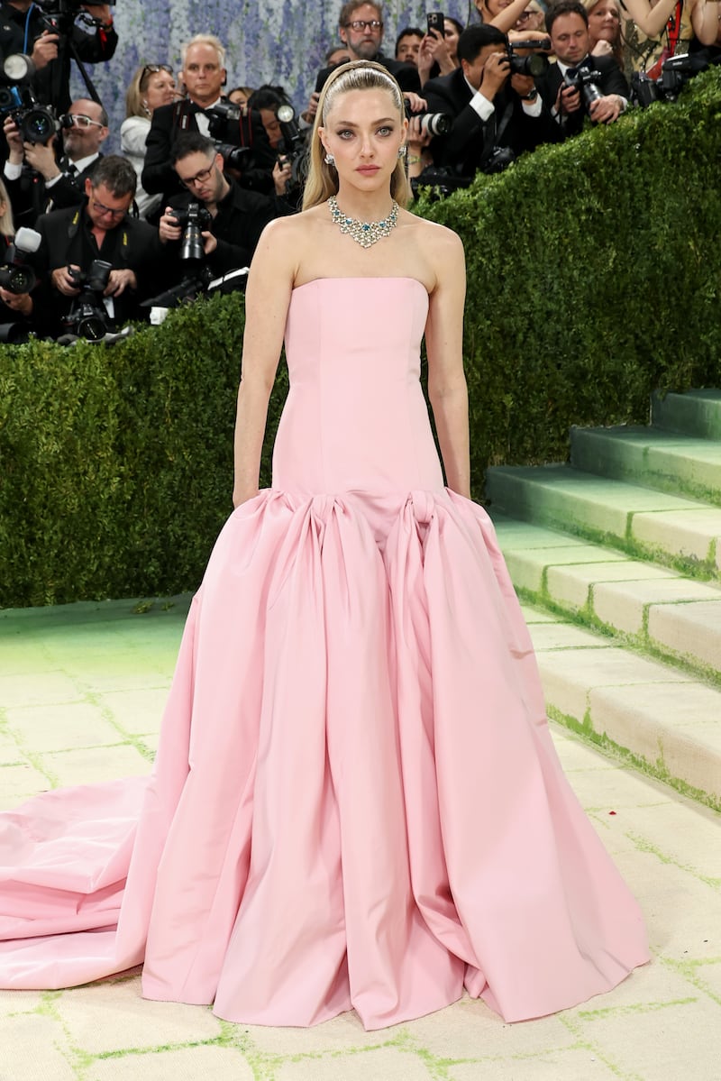 Amanda Seyfried in pink Prada. Photograph: Jamie McCarthy/Getty Images