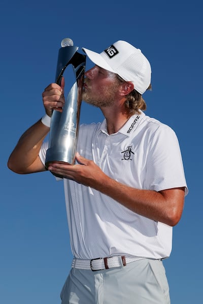 Kristoffer Reitan poses with the trophy after winning the Truist Championship at Quail Hollow Country Club on Sunday in Charlotte, North Carolina. Photograph: Andrew Redington/Getty Images
