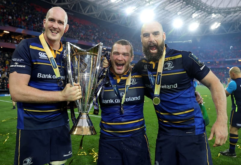 Leinster's Devin Toner, Jack McGrath and Scott Fardy celebrate with the European Rugby Champions Cup trophy. Photograph: Dan Sheridan/Inpho
