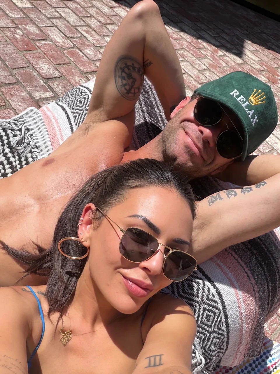 The couple, seen above in Parrish’s birthday tribute, first sparked dating rumors in April. janel parrish/ instagram