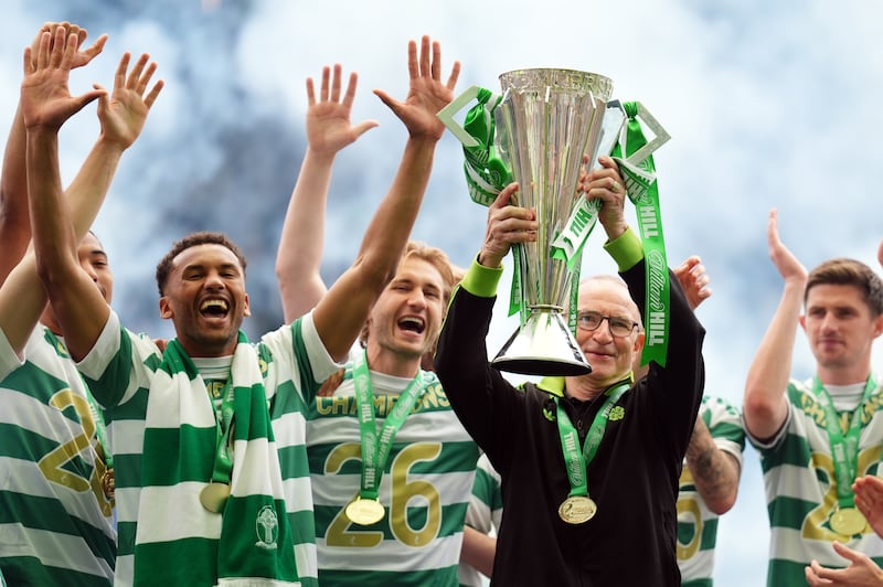 Celtic manager Martin O'Neill lifts the Scottish Premier League trophy at Celtic Park. Photograph: Andrew Milligan/PA Wire