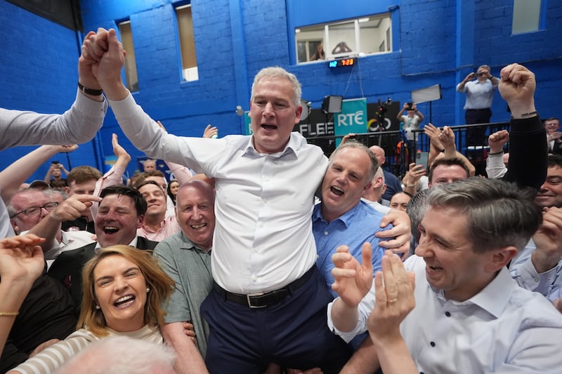 Fine Gael candidate Seán Kyne celebrates with Tánaiste and Fine Gael leader Simon Harris and supporters after winning the Galway West byelection.
Photograph: Niall Carson/PA Wire