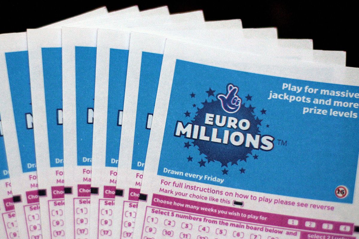 Lottery tickets for the EuroMillions jackpot are displayed in central London, on February 8, 2008. Lottery history could be made later Friday in the EuroMillions draw. The 95m (approx 127.6m euros/185m USD) prize will be the biggest pay-out of its kind in the world if it is won by a single ticket holder. AFP PHOTO/SHAUN CURRY (Photo credit should read SHAUN CURRY/AFP via Getty Images)
