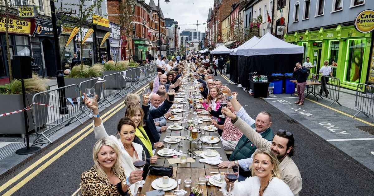 No more hiding from summer rain as Cork on a Fork's shared table has a cover for the first time