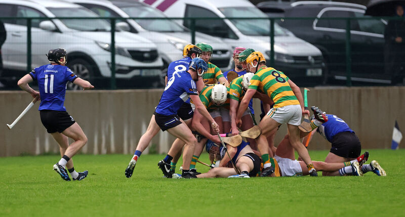 Tempers flare in the first half between Sarsfields and Blackrock. Picture: Jim Coughlan.