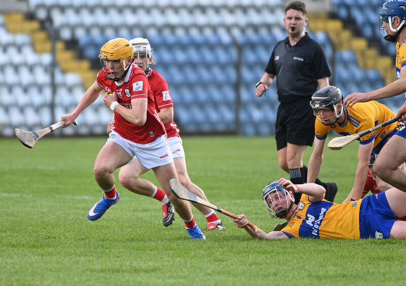 Cork's Tadhg McCarthy breaks from Clare's Colm Daly. Picture: Eddie O'Hare