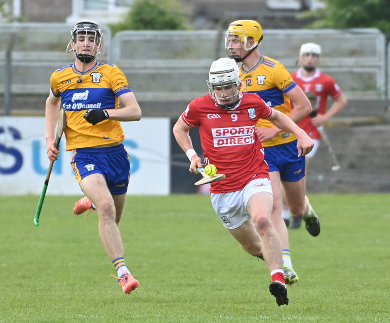Cork's Stephen McHugh racing away from Clare's Oran Duignan. Picture: Eddie O'Hare