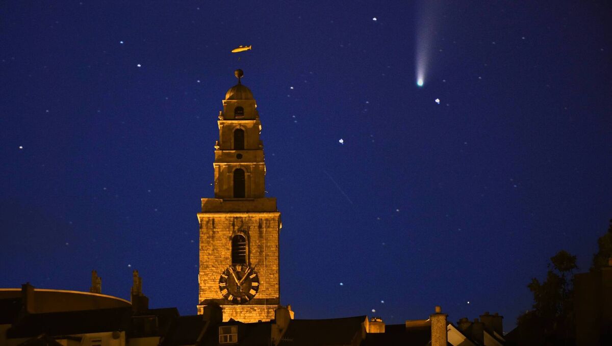 Comet Neowise seen above Shandon Tower in Cork city. The comet appeared in summer, 2020, and will not be seen again for 6,800 years. While many can be seen on a regular basis through a telescope, truly visible ones might come along but once or twice in a lifetime.	Picture: Denis Scannell
                    