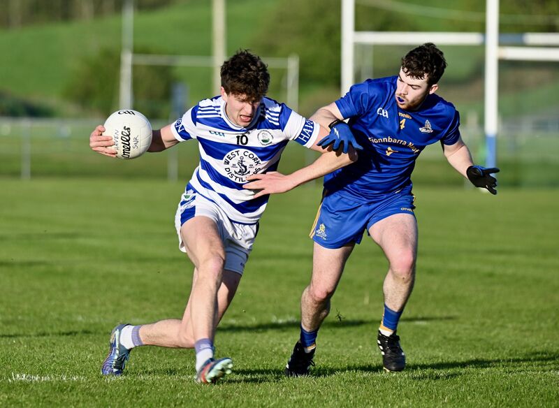  James Kennefick of St Finbarr’s chases Seán Browne of Castlehaven. Picture: Larry Cummins