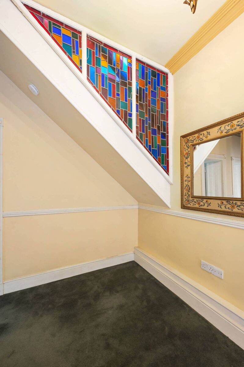 Stained glass on the upper staircase