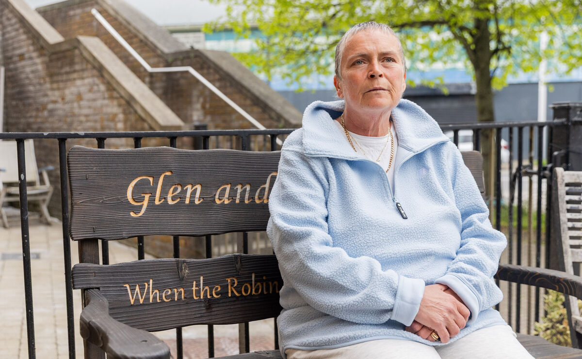 Rose Osborne sitting on a bench dedicated to her son Glen at her home. Picture: Gareth Chaney