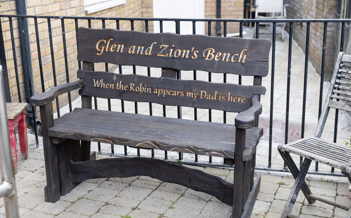 A bench dedicated to Glen in Rose's garden. Picture: Gareth Chaney